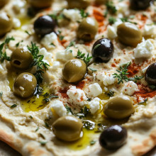 Mediterranean Flatbread with Hummus, Feta, and Olives