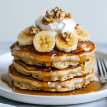 Fluffy Banana Nut Pancakes with Maple Syrup